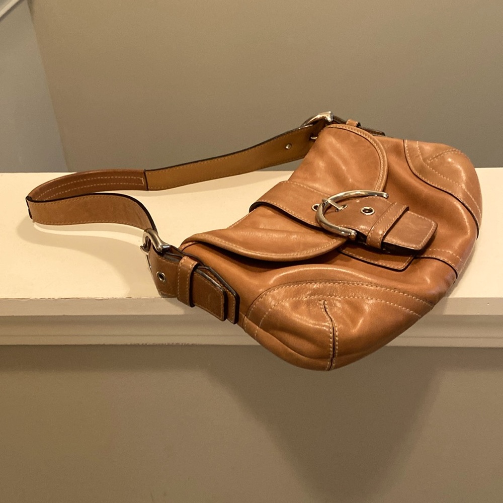 Adorable small authentic coach shoulder purse. Serial# No. L050-9247.